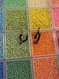 bronze colored and black beaded earrings